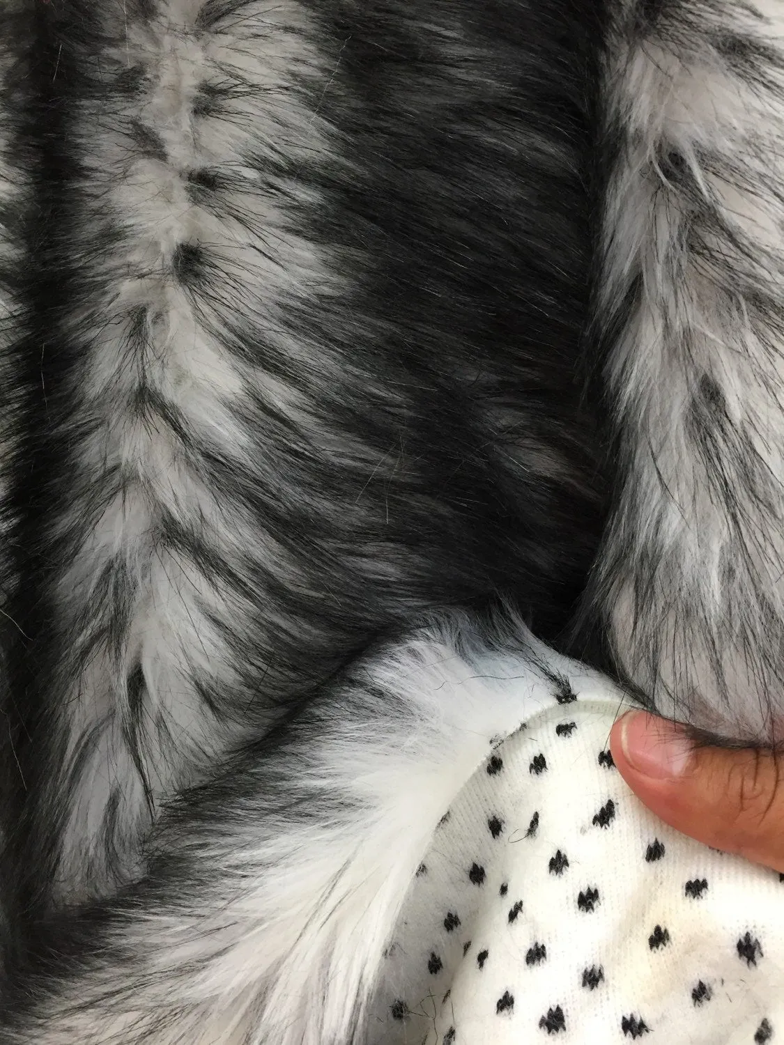 White/black husky faux fur, 2 tone shaggy faux fur. Sold by the yard.60" wide.